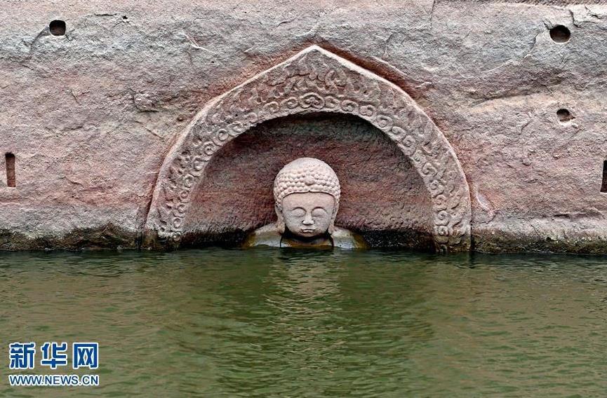 江西南城一水库发现摩崖造像 佛头遗迹浮出水