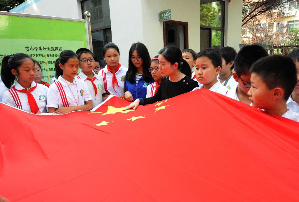 省国土资源厅组织志愿者到合肥市安居苑小学向