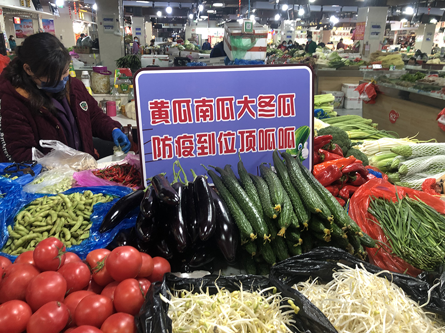 “土味防疫語”守好“菜籃子”。王磊攝