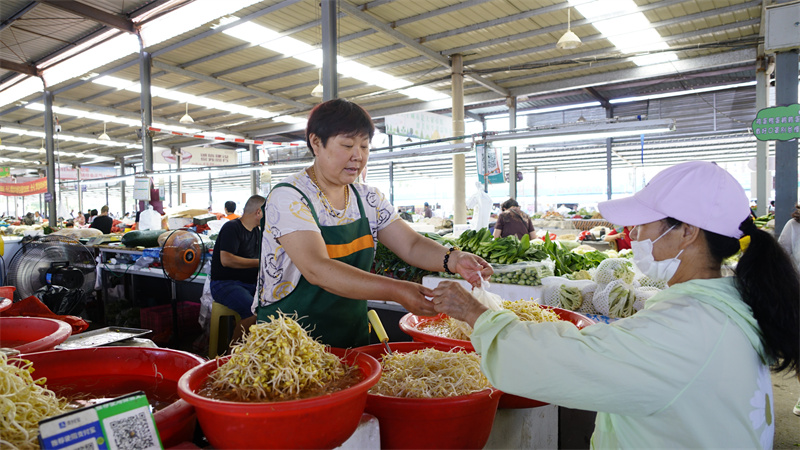 文明菜市行动。杜集区委宣传部供图