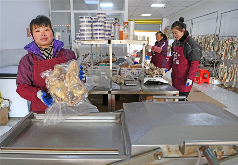 各類特色臘味銷往全國各地。陳彬攝