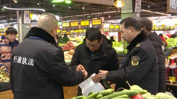 检查食品安全。张祖北供图