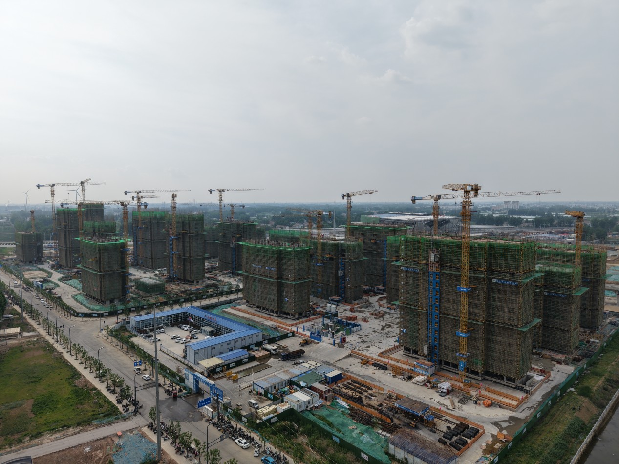 安置房项目同步建设中。赵晓奇摄