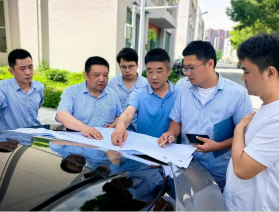 討論接水設計方案。合肥水務集團供圖