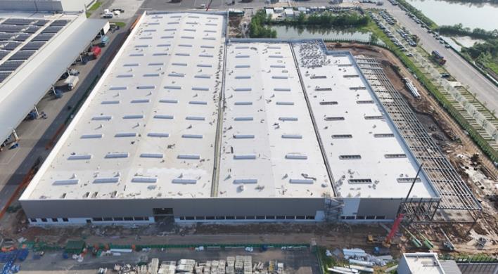 中国化学三化建安庆经开区KD包装中心项目钢结构厂房主体结构顺利完成。中国化学三化建供图
