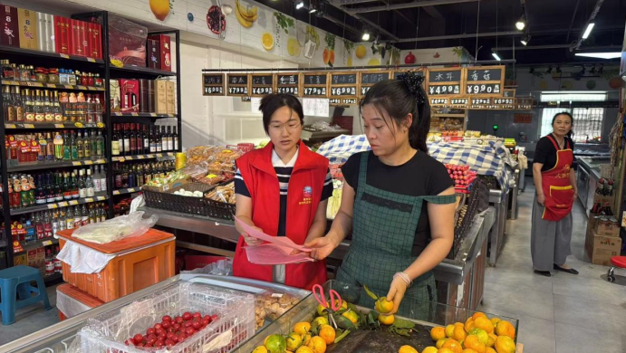進超市普及食品安全法規。